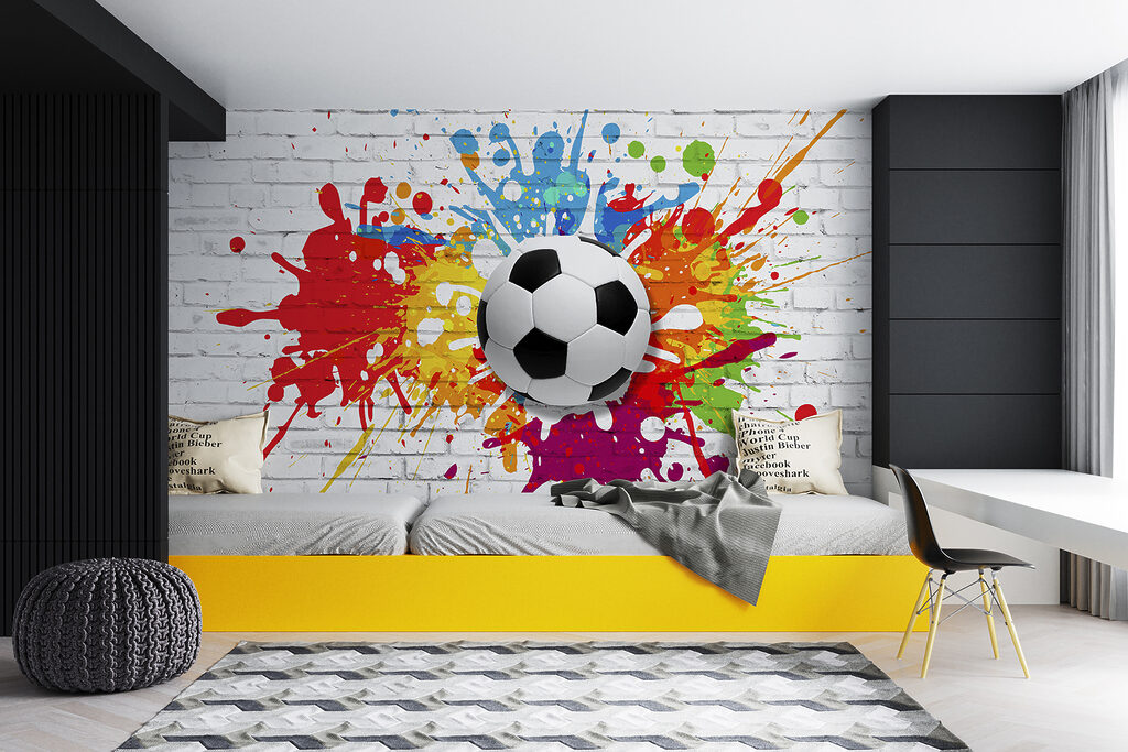 Football ball on a brick wall