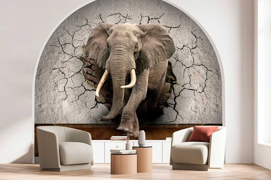 An elephant coming through a wall