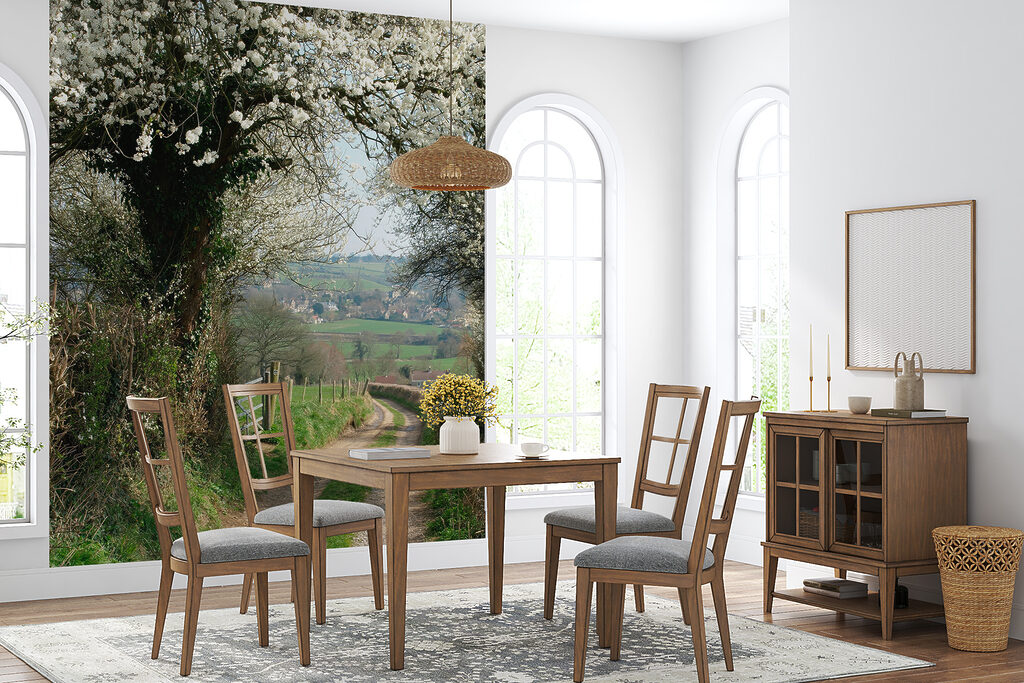 Dirt road with white flowers on it