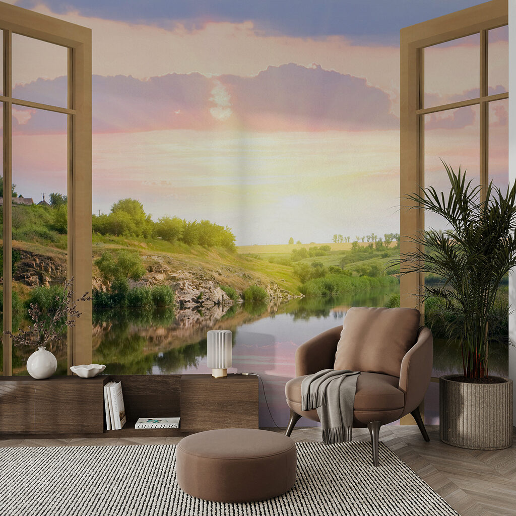 Window with a view of a river and a grassy hill