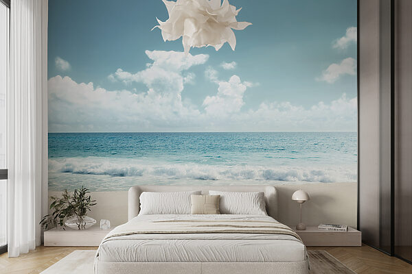 A beach with waves crashing on the sand