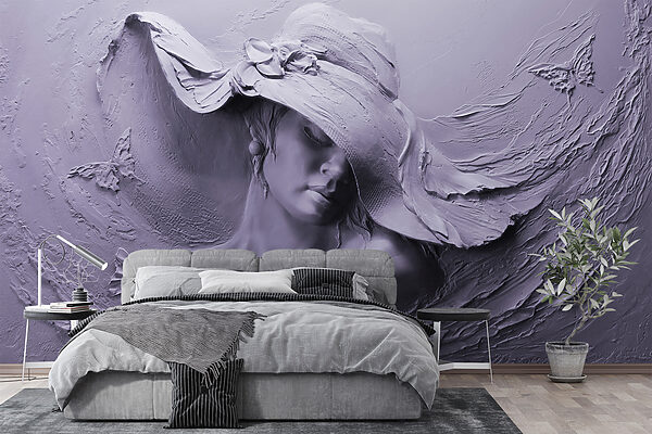 A sculpture of a woman in a hat