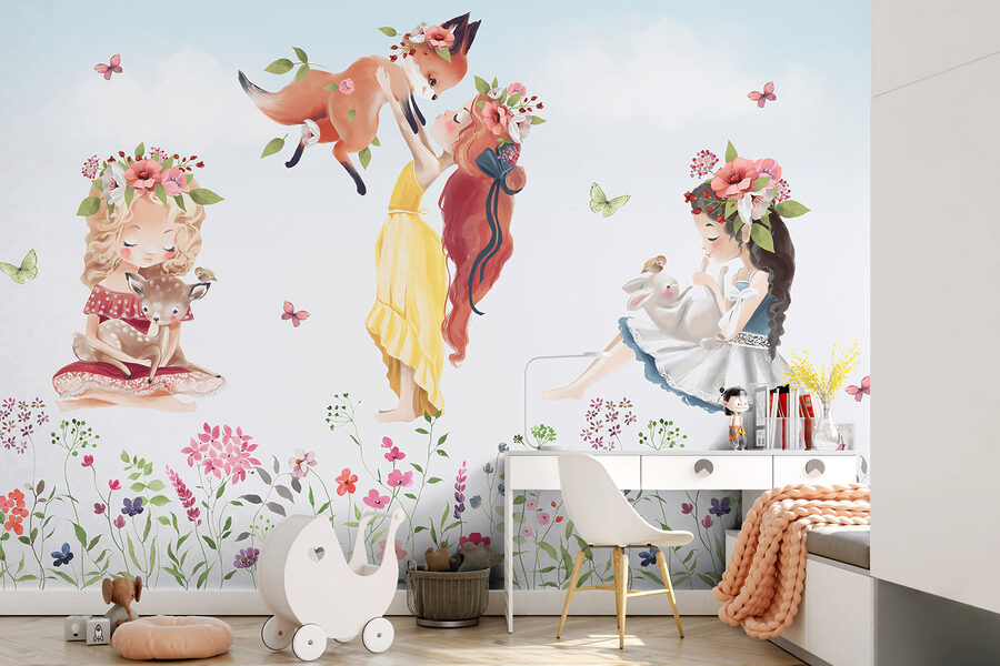 Group of girls holding animals in a field of flowers Group of girls holding animals in a field of flowers