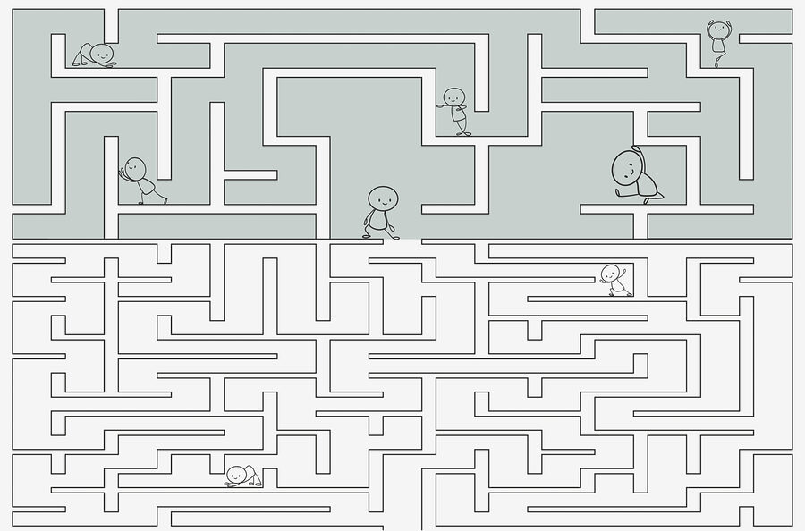 Maze with people walking through the maze Maze with people walking through the maze