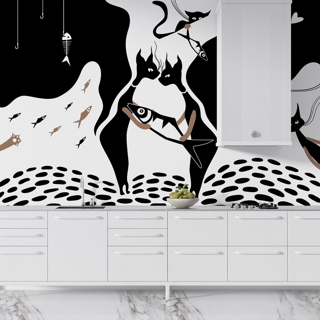 Black and white cat with fish and fish