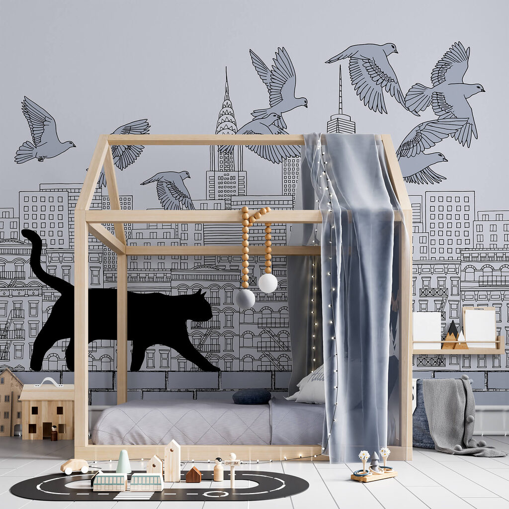 Cat walking on a wall with birds flying in the sky Cat walking on a wall with birds flying in the sky