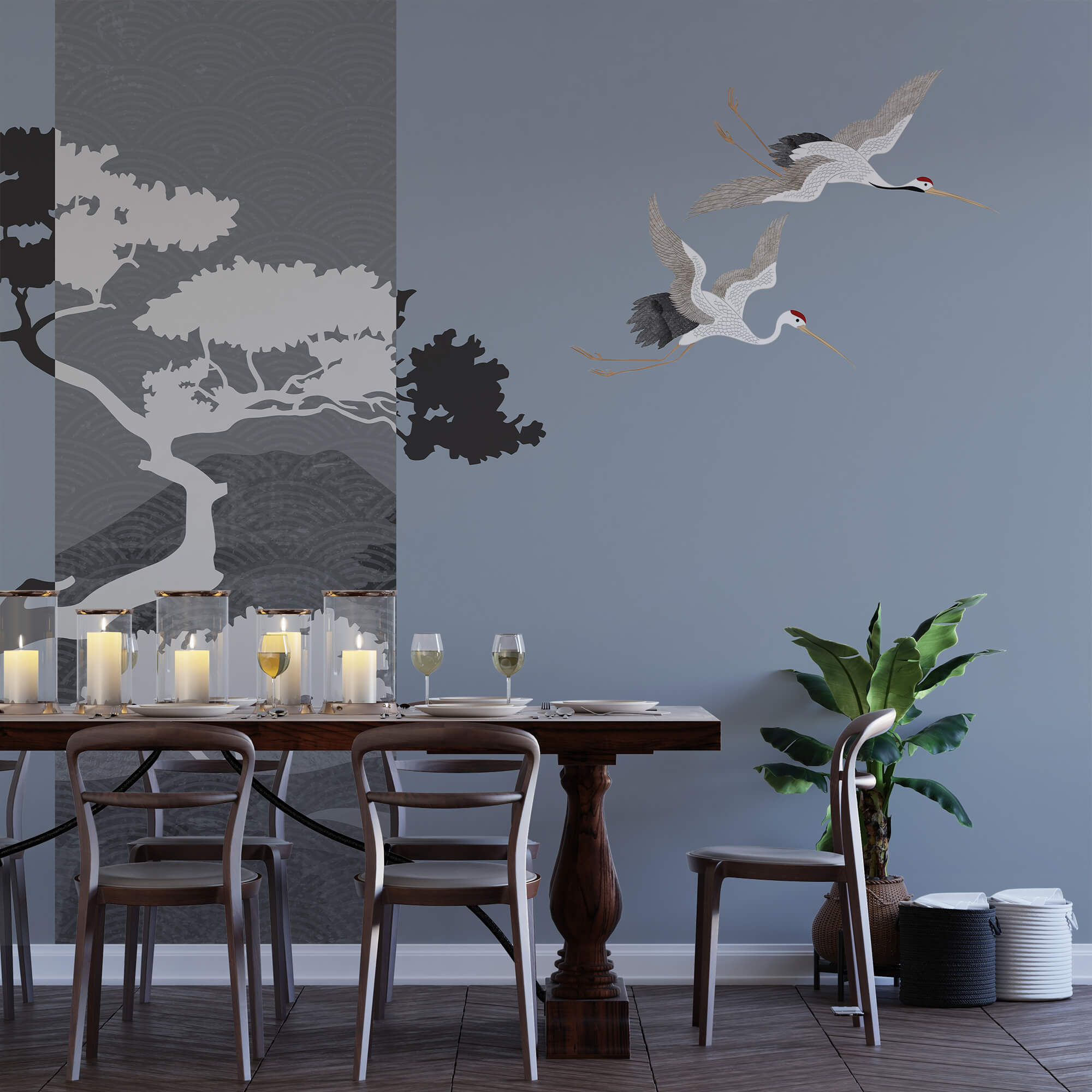 Couple of cranes flying next to a tree