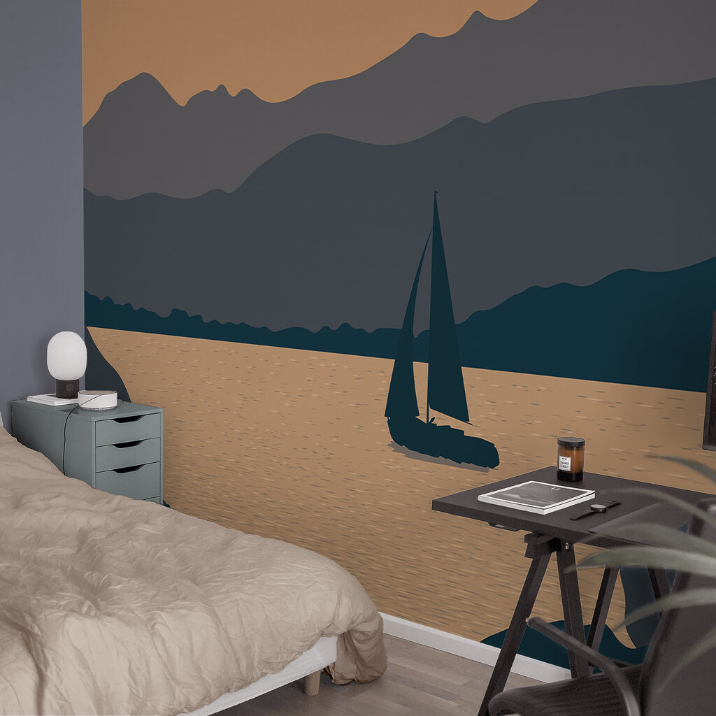 Sailboat on water with mountains in the background