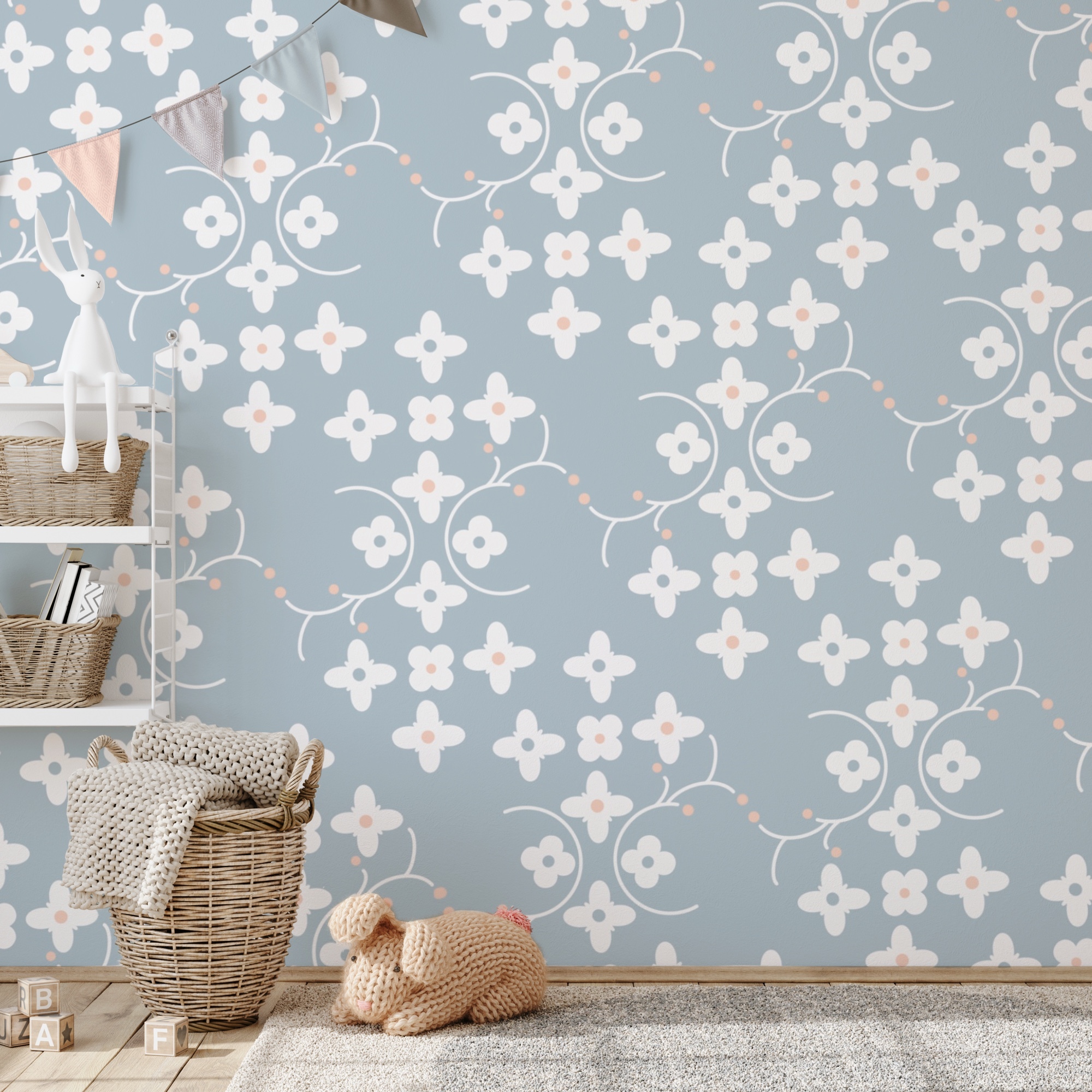 Pattern of white flowers and pink dots on a blue background