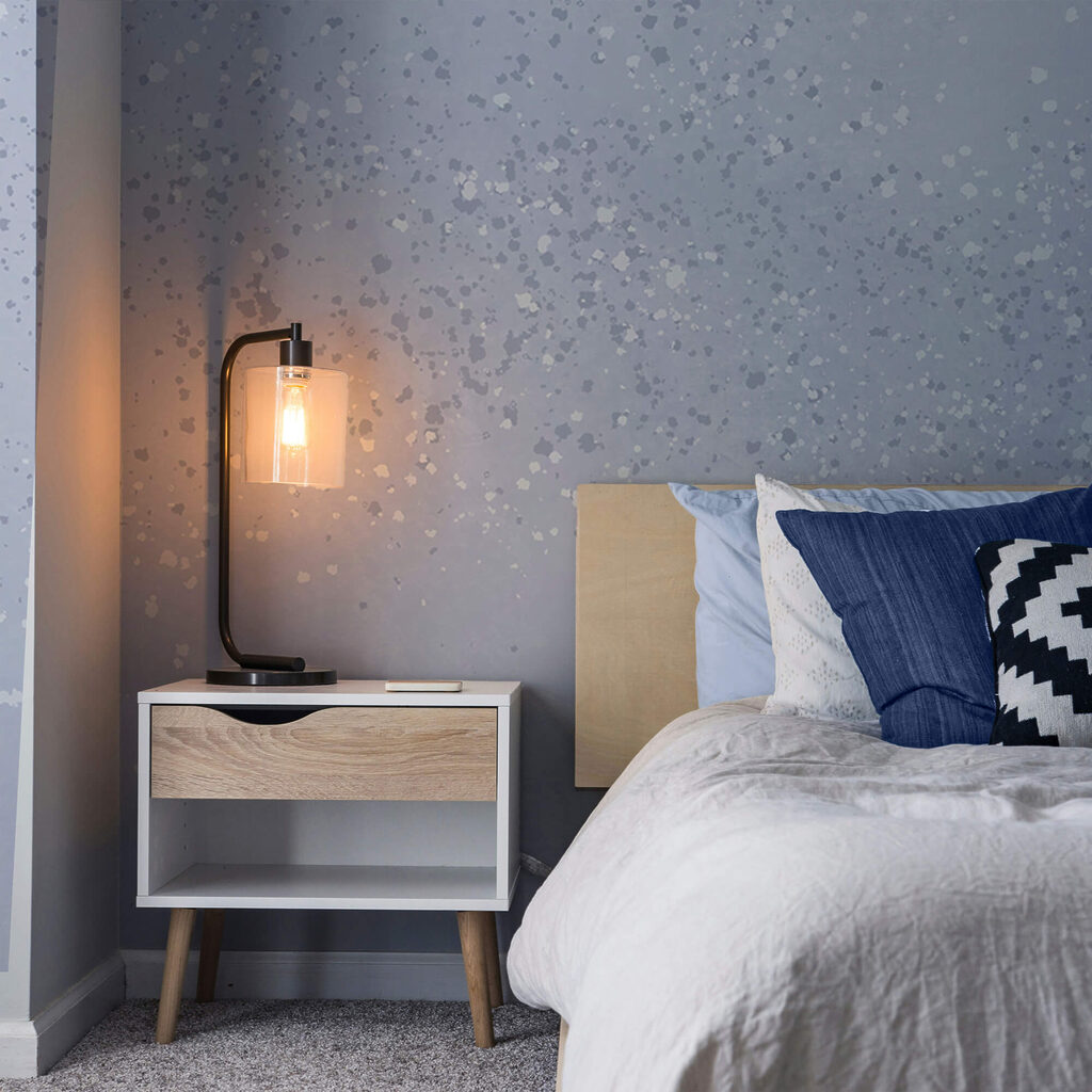 White and purple background with small specks White and purple background with small specks