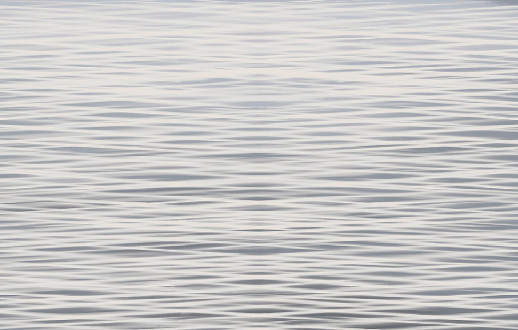Waves dancing on a tranquil surface