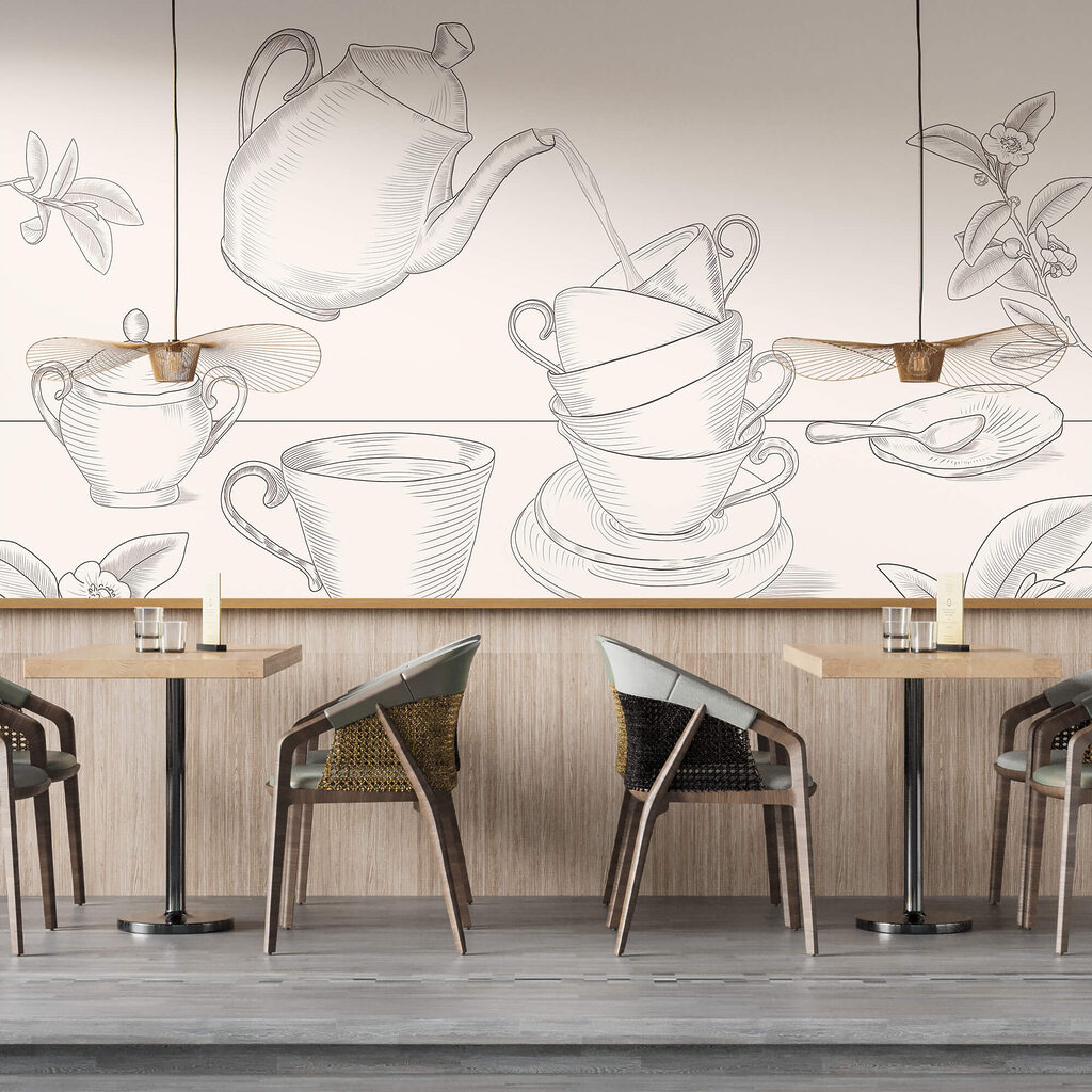 Teapot pouring into a stack of teacups