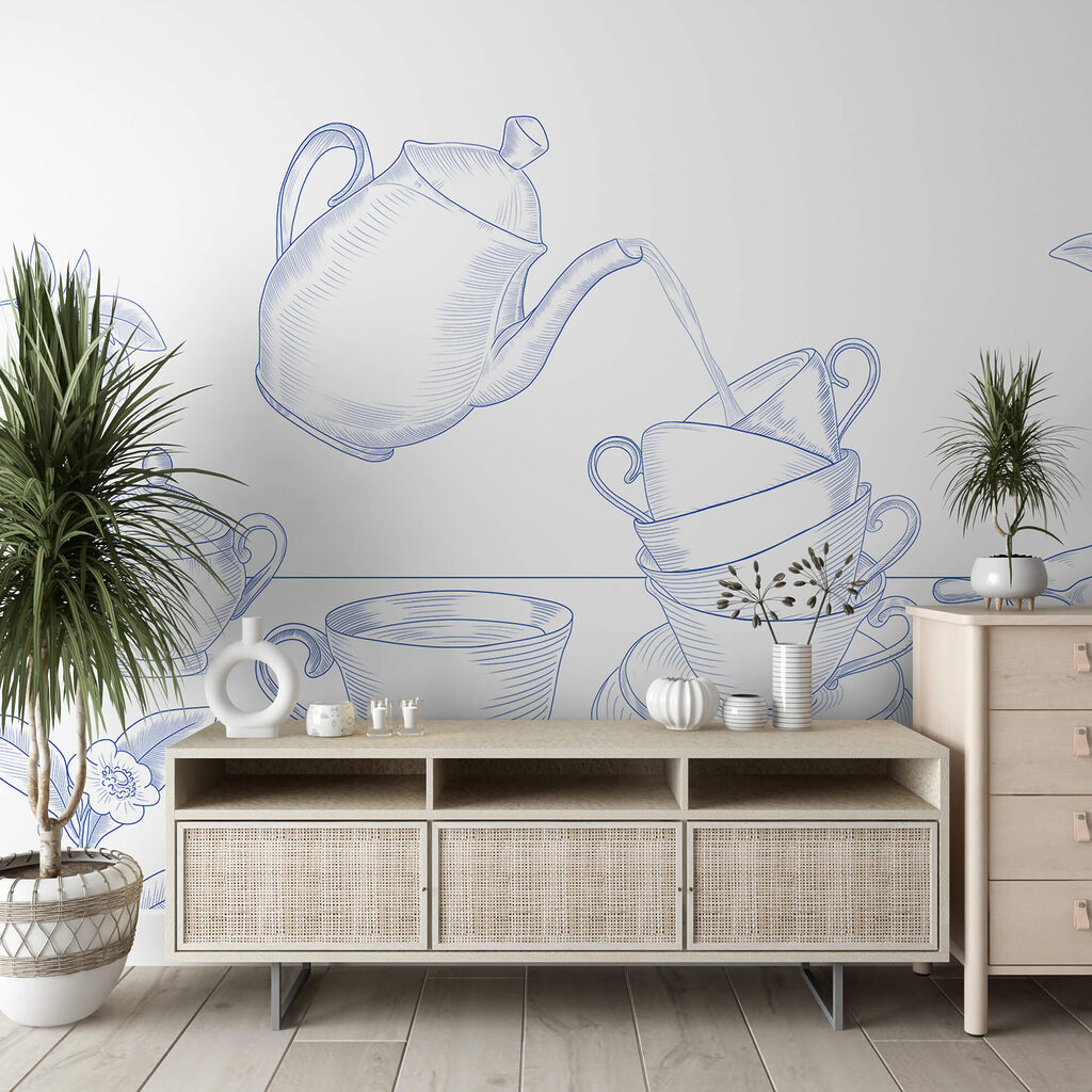 Teapot pouring into a stack of teacups