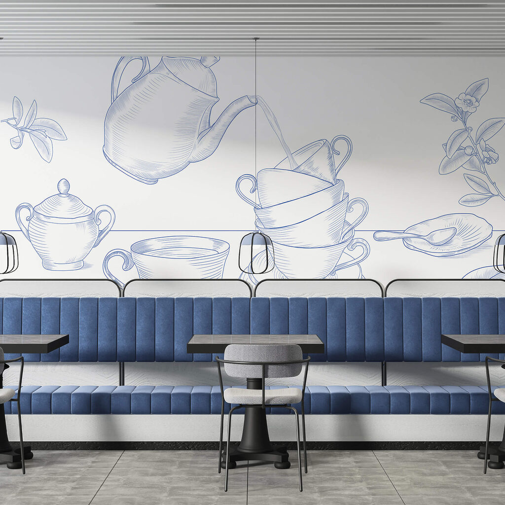 Teapot pouring into a stack of teacups