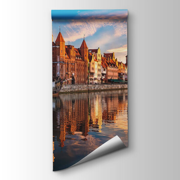 Body of water with buildings and boats in it