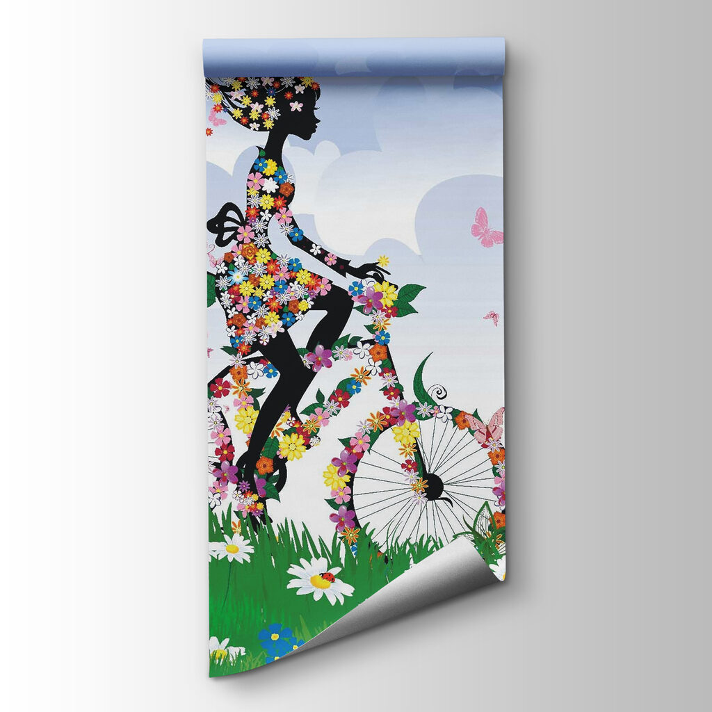 Woman riding a bicycle with flowers Woman riding a bicycle with flowers