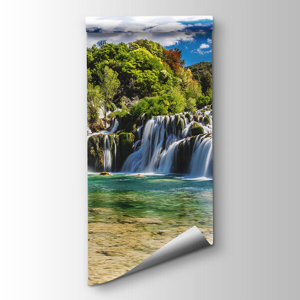 Krka National Park surrounded by trees and a blue sky Krka National Park surrounded by trees and a blue sky