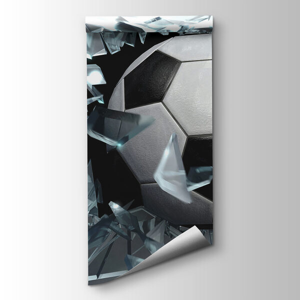 Football ball breaking through glass