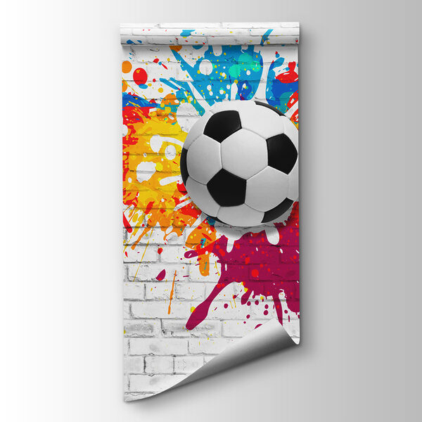 Football ball on a brick wall