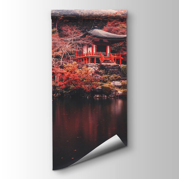 Small building with red bridge over water