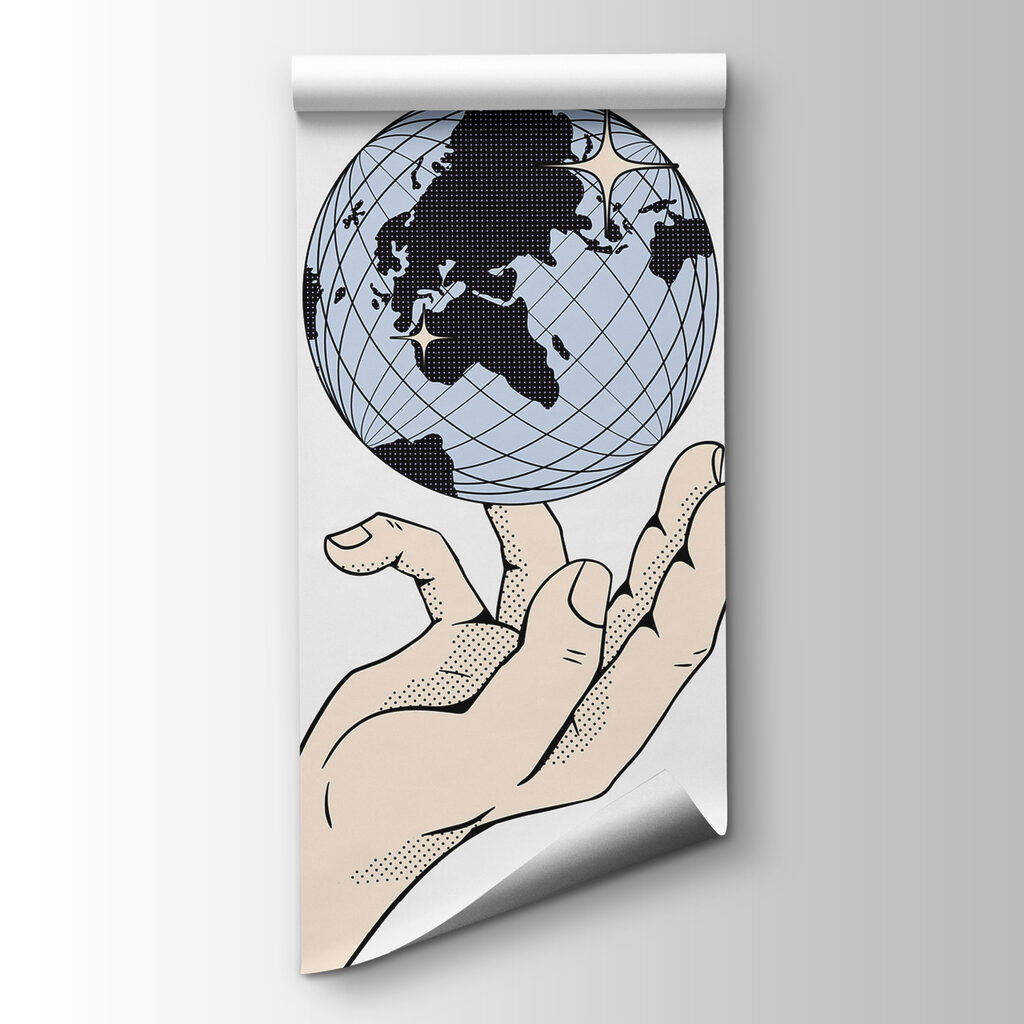 Hand holding a globe