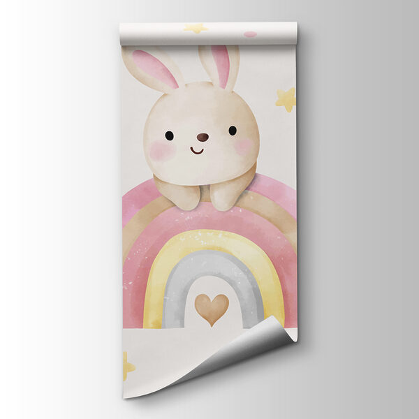 A cartoon bunny on a rainbow