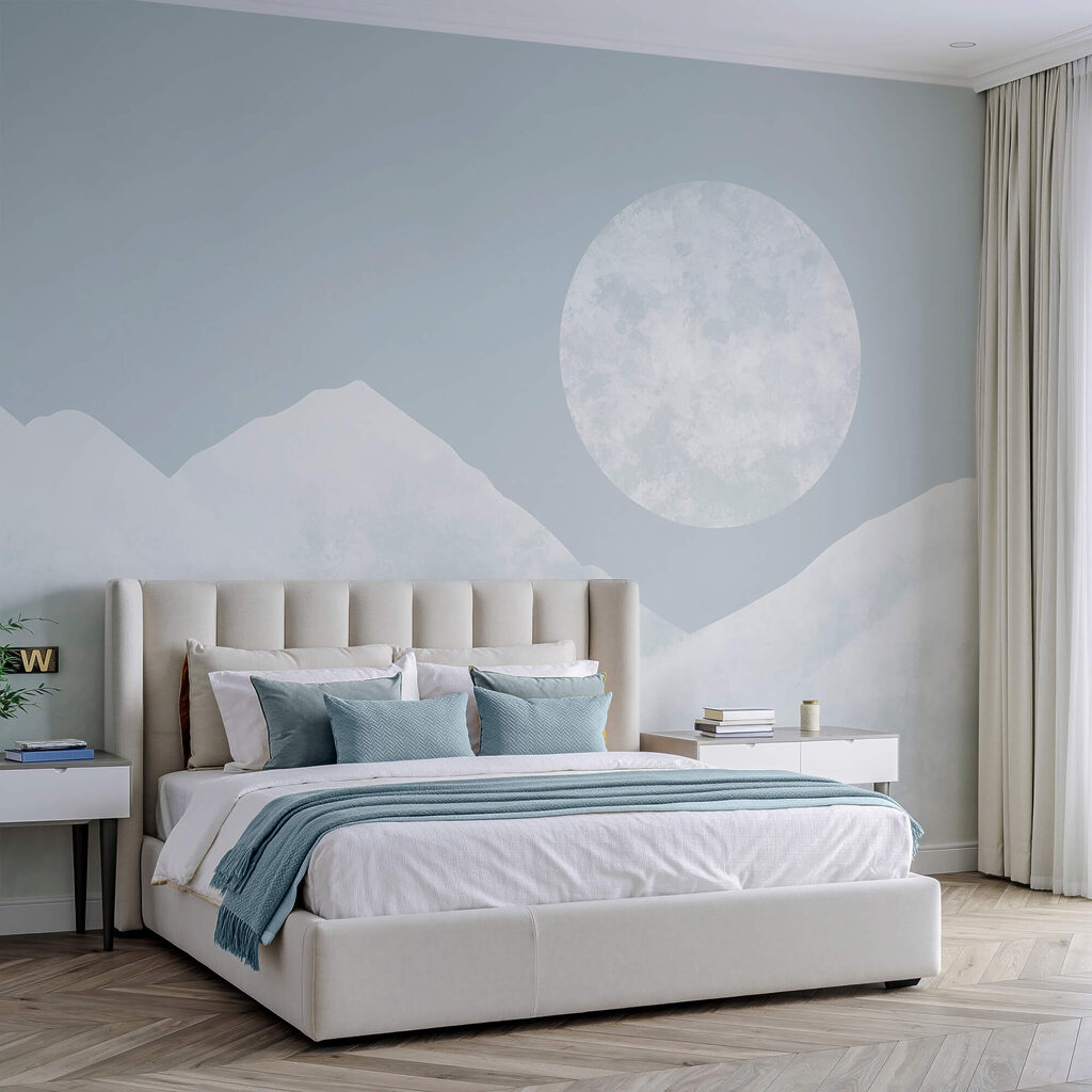 Moon over a snowy mountain