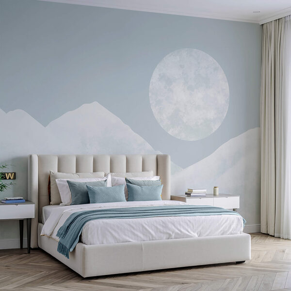 Moon over a snowy mountain