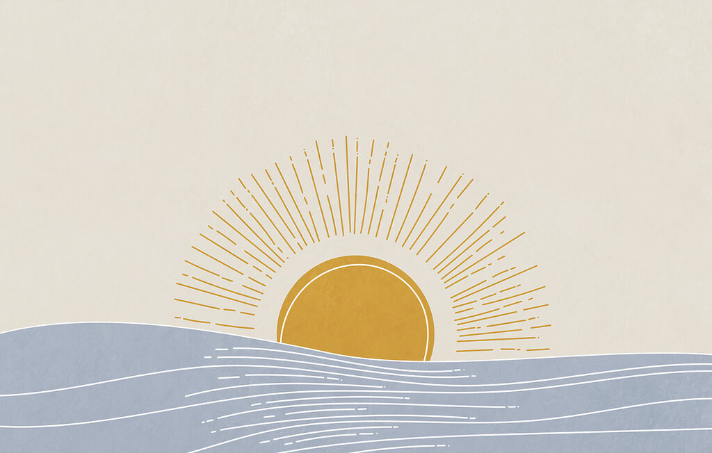 Sun rising over water